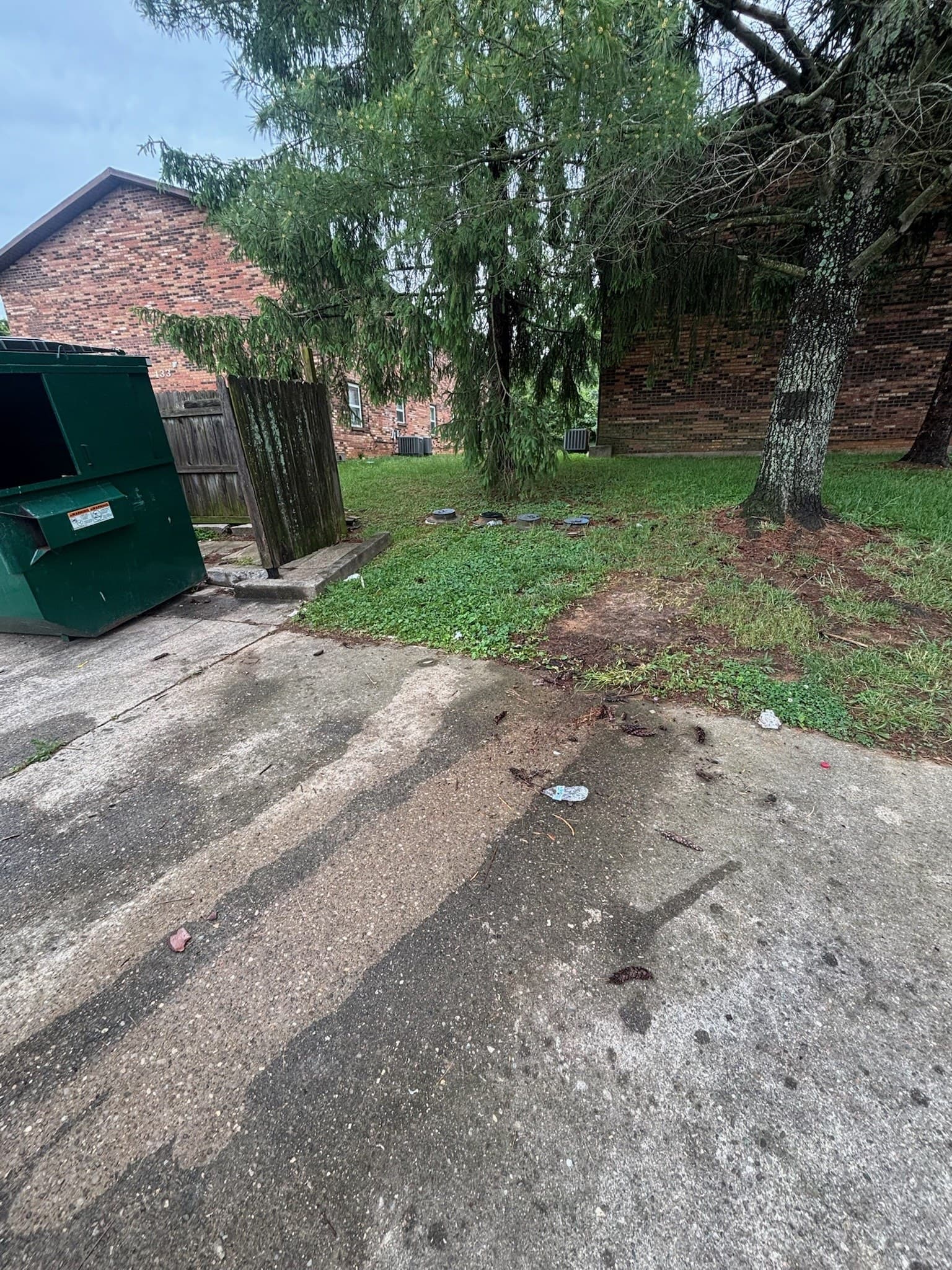 Apartment dumpster area cleared by Bag It Up