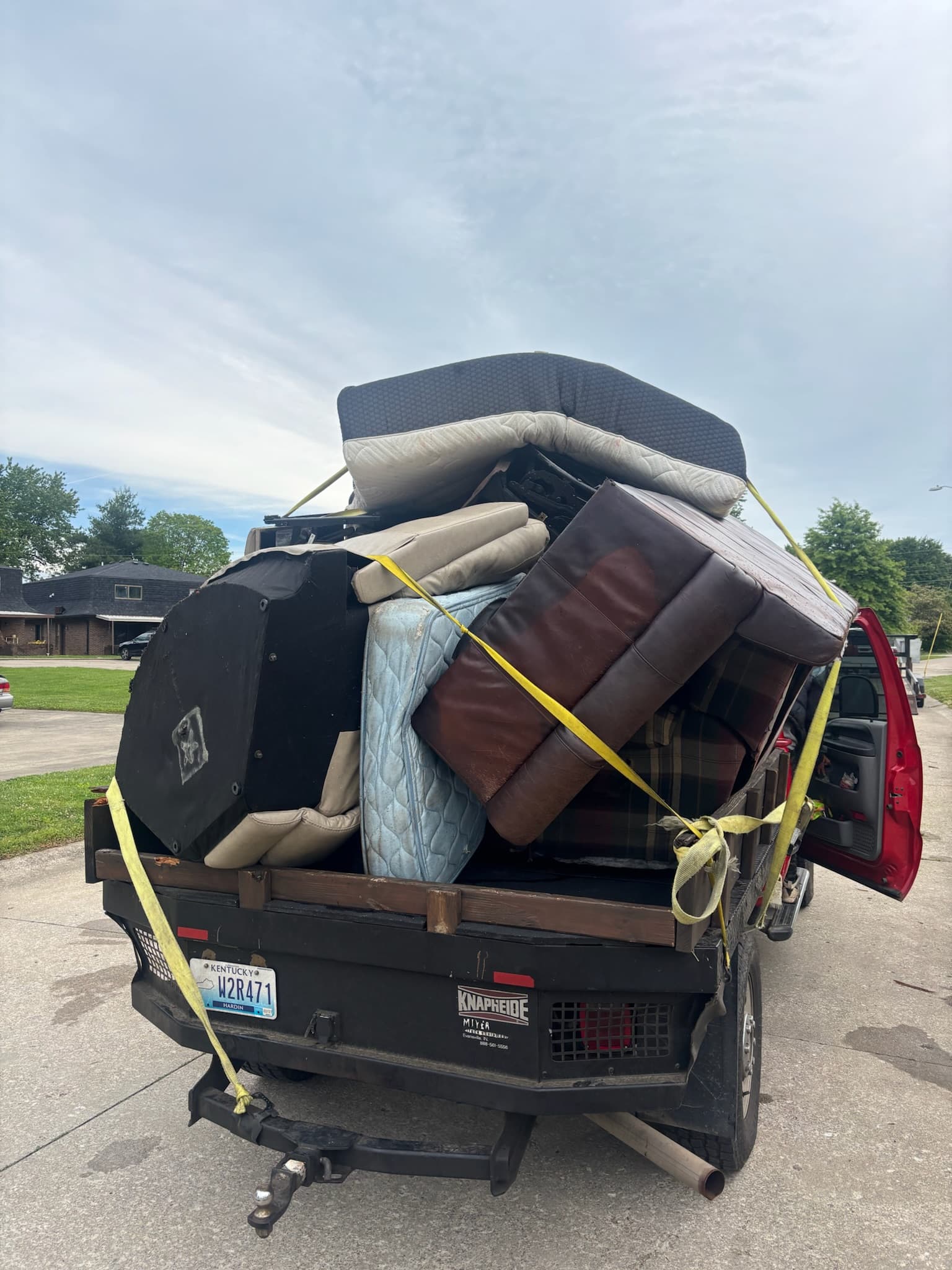 Truck fully loaded with furniture by Bag It Up